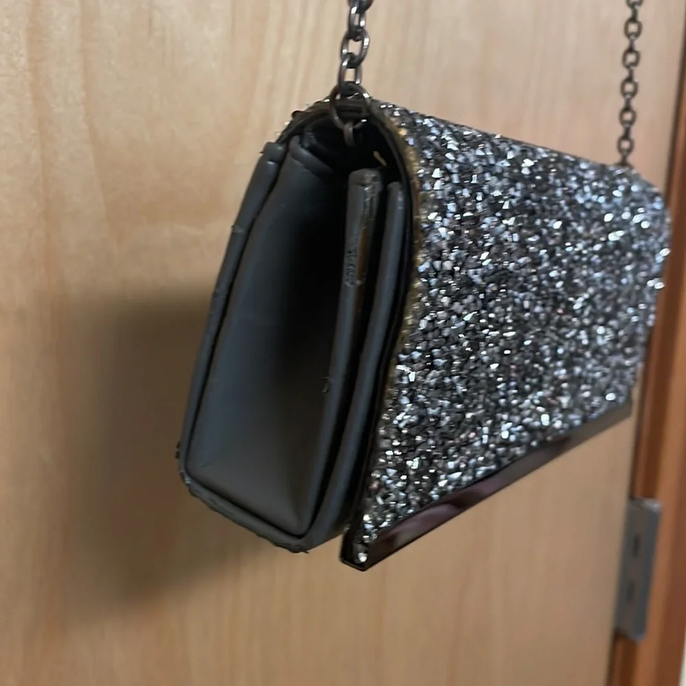 Saks Fifth Avenue sparkly gemstones clutch with chain link strap.